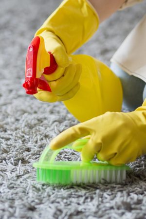 close-up-disinfecting-with-cleaning-supplies